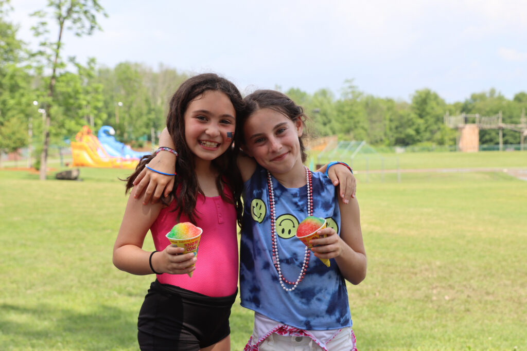 Two female campers enjoying the outdoors