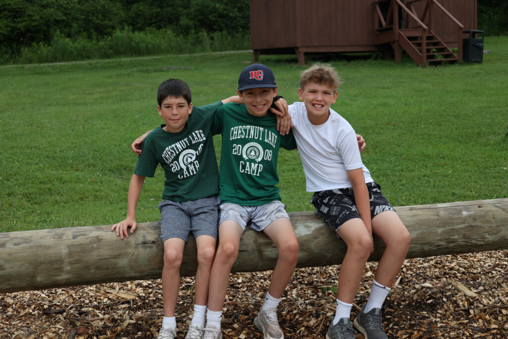 Three Chestnut Lake Campers enjoying Summer outdoors.